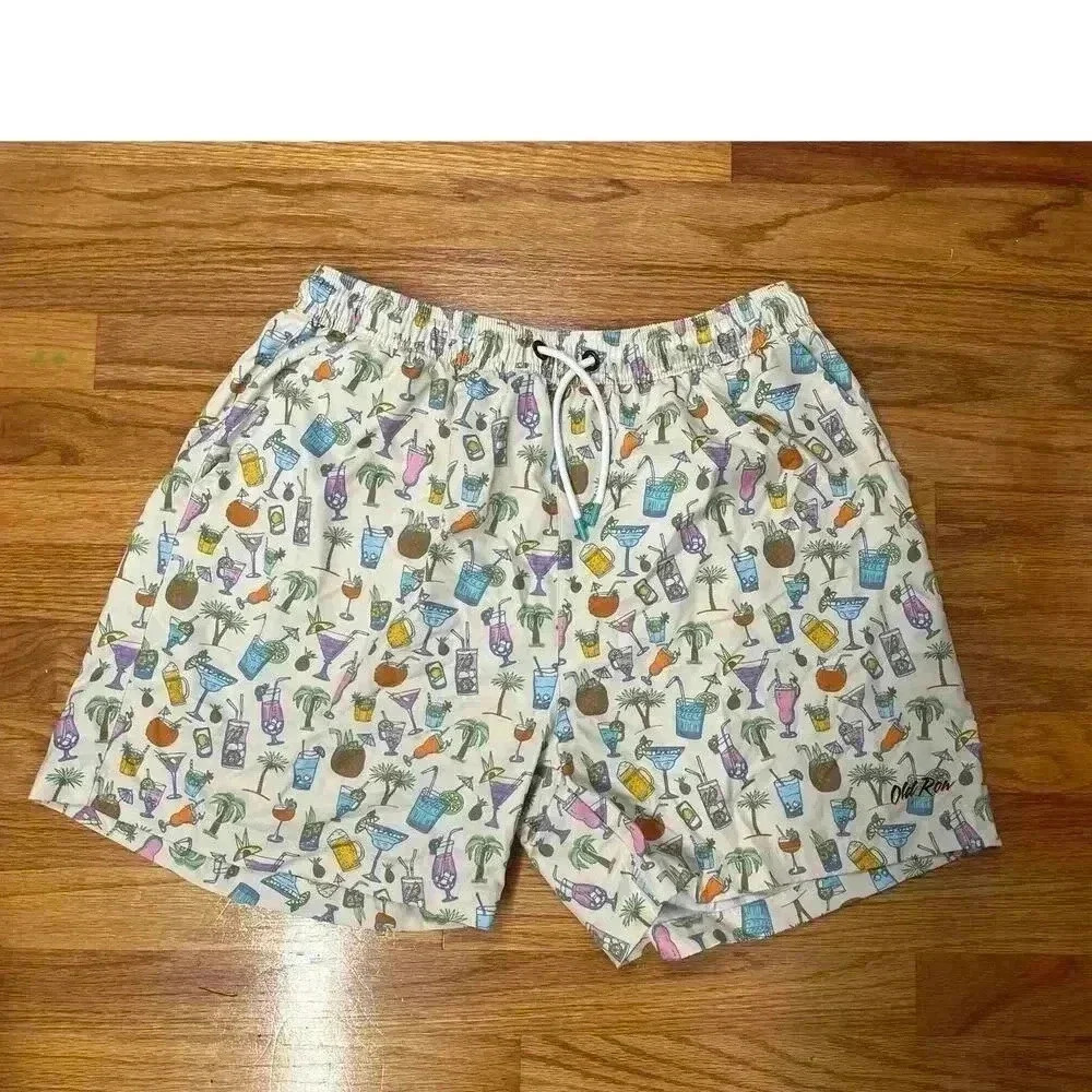 Old row mixed drinks stretch swim trunks. Size XL